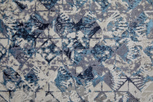 Blue Ivory And Gray Geometric Power Loom Distressed Area Rug - 4' X 6'
