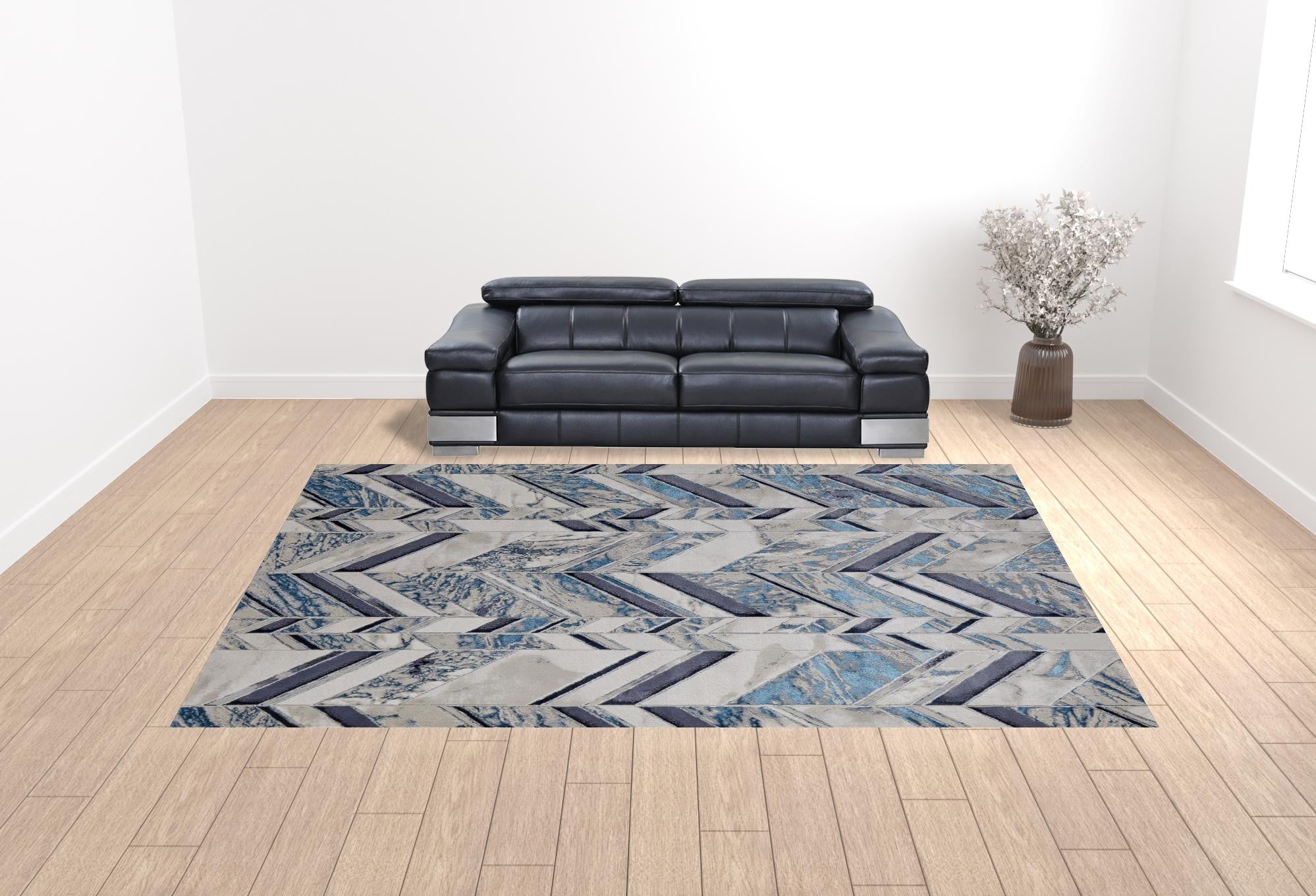 10' X 13' Ivory Blue And Gray Chevron Power Loom Distressed Area Rug