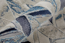 10' X 13' Ivory Blue And Gray Chevron Power Loom Distressed Area Rug