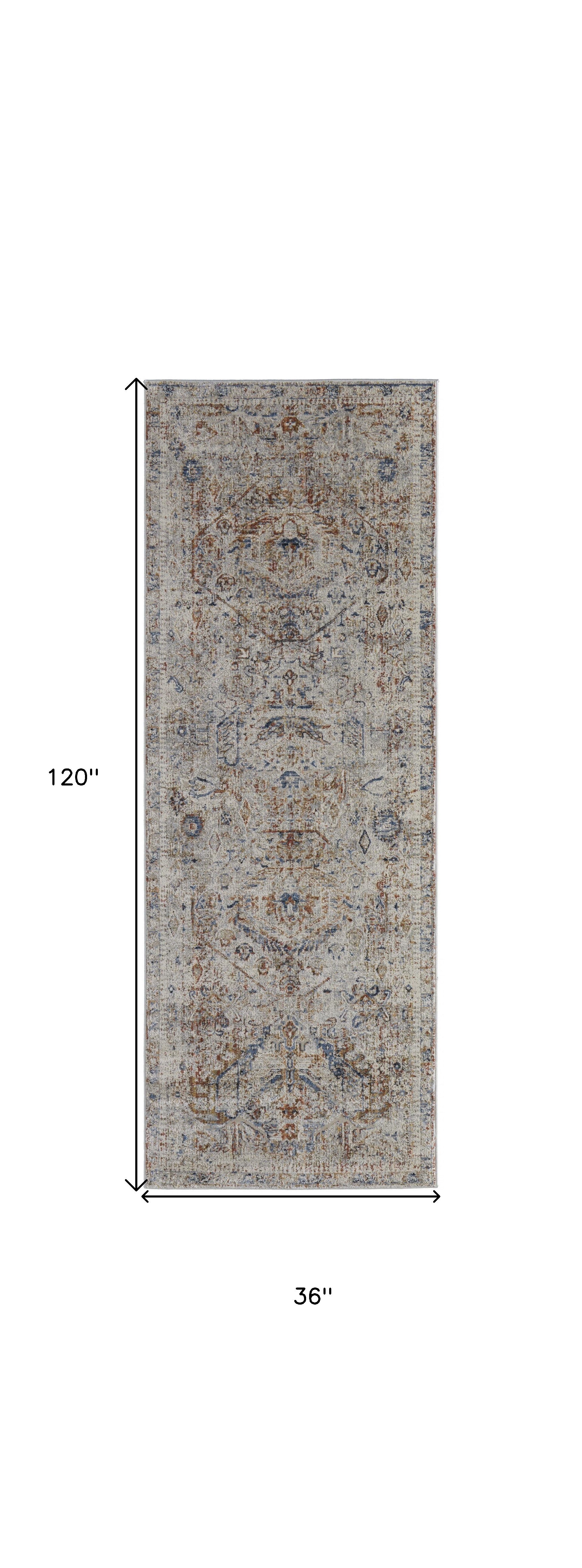 5' X 8' Tan Orange And Red Floral Power Loom Distressed Area Rug With Fringe