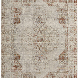 5' X 8' Tan Ivory And Orange Floral Power Loom Distressed Area Rug With Fringe