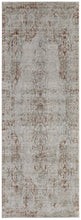 5' X 8' Tan Ivory And Orange Floral Power Loom Distressed Area Rug With Fringe