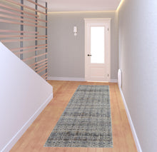 5' X 8' Tan Ivory And Blue Geometric Power Loom Distressed Area Rug With Fringe