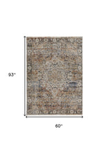Tan Orange And Blue Floral Power Loom Distressed Area Rug With Fringe - 5' x 8'