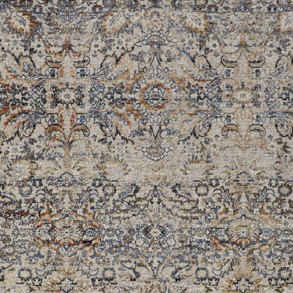 5' X 8' Tan Blue And Orange Floral Power Loom Distressed Area Rug With Fringe