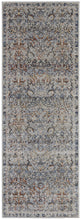 5' X 8' Tan Blue And Orange Floral Power Loom Distressed Area Rug With Fringe