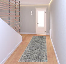 5' X 8' Ivory Gray And Taupe Abstract Power Loom Distressed Area Rug With Fringe