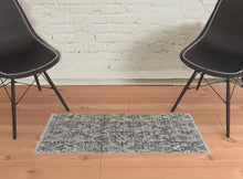 5' X 8' Ivory Gray And Taupe Abstract Power Loom Distressed Area Rug With Fringe