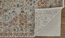 5' X 8' Tan Ivory And Orange Floral Power Loom Area Rug With Fringe