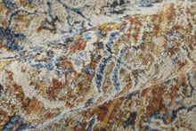 5' X 8' Tan Ivory And Orange Floral Power Loom Area Rug With Fringe