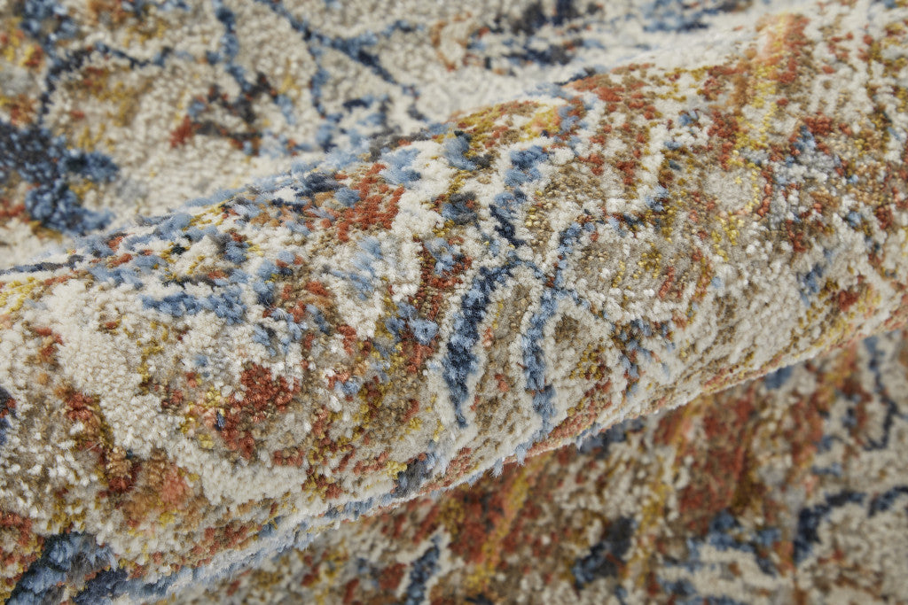 5' X 8' Tan Ivory And Orange Floral Power Loom Area Rug With Fringe