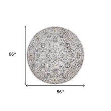 4' X 6' Tan Ivory And Blue Floral Stain Resistant Area Rug