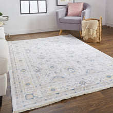 4' X 6' Tan Ivory And Blue Floral Stain Resistant Area Rug