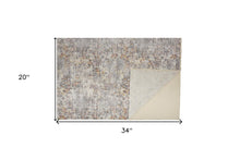 4' X 6' Ivory Tan And Taupe Abstract Stain Resistant Area Rug