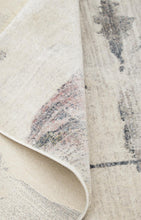 5' X 7' Ivory Blue And Pink Abstract Stain Resistant Area Rug