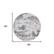 5' X 7' Ivory Blue And Pink Abstract Stain Resistant Area Rug