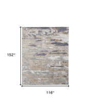 Tan Orange And Ivory Abstract Power Loom Distressed Area Rug - 4' x 6'