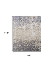 4' X 6' Tan Ivory And Blue Abstract Power Loom Distressed Area Rug