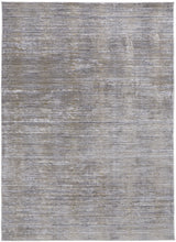 4' X 6' Taupe Silver And Tan Abstract Power Loom Area Rug