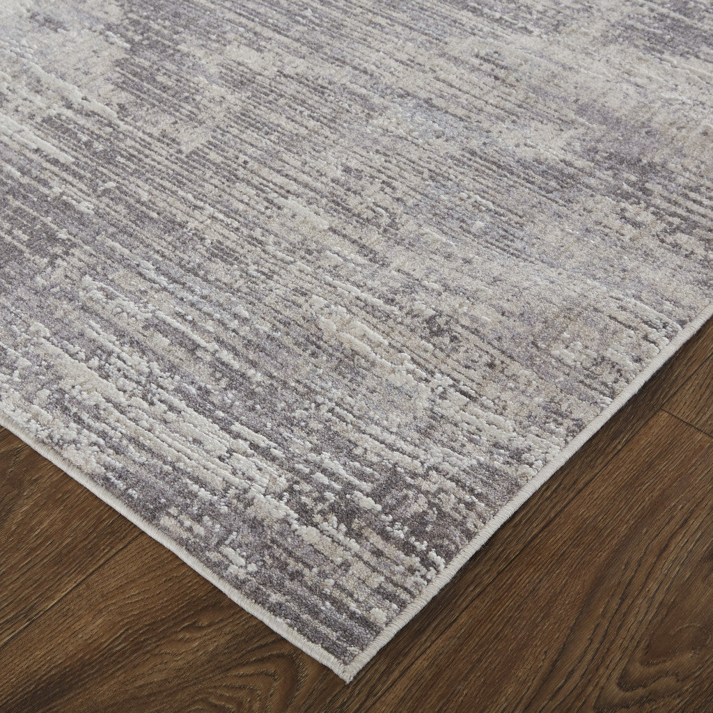 4' X 6' Tan Taupe And Gray Abstract Power Loom Distressed Stain Resistant Area Rug