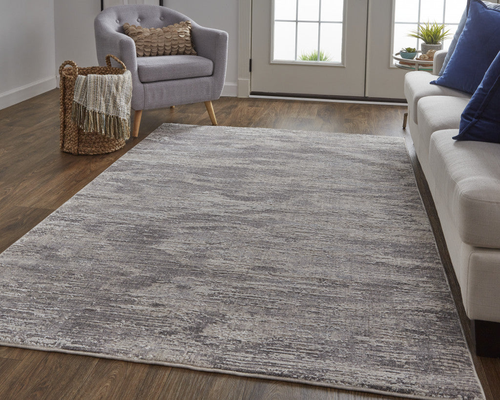 4' X 6' Tan Taupe And Gray Abstract Power Loom Distressed Stain Resistant Area Rug