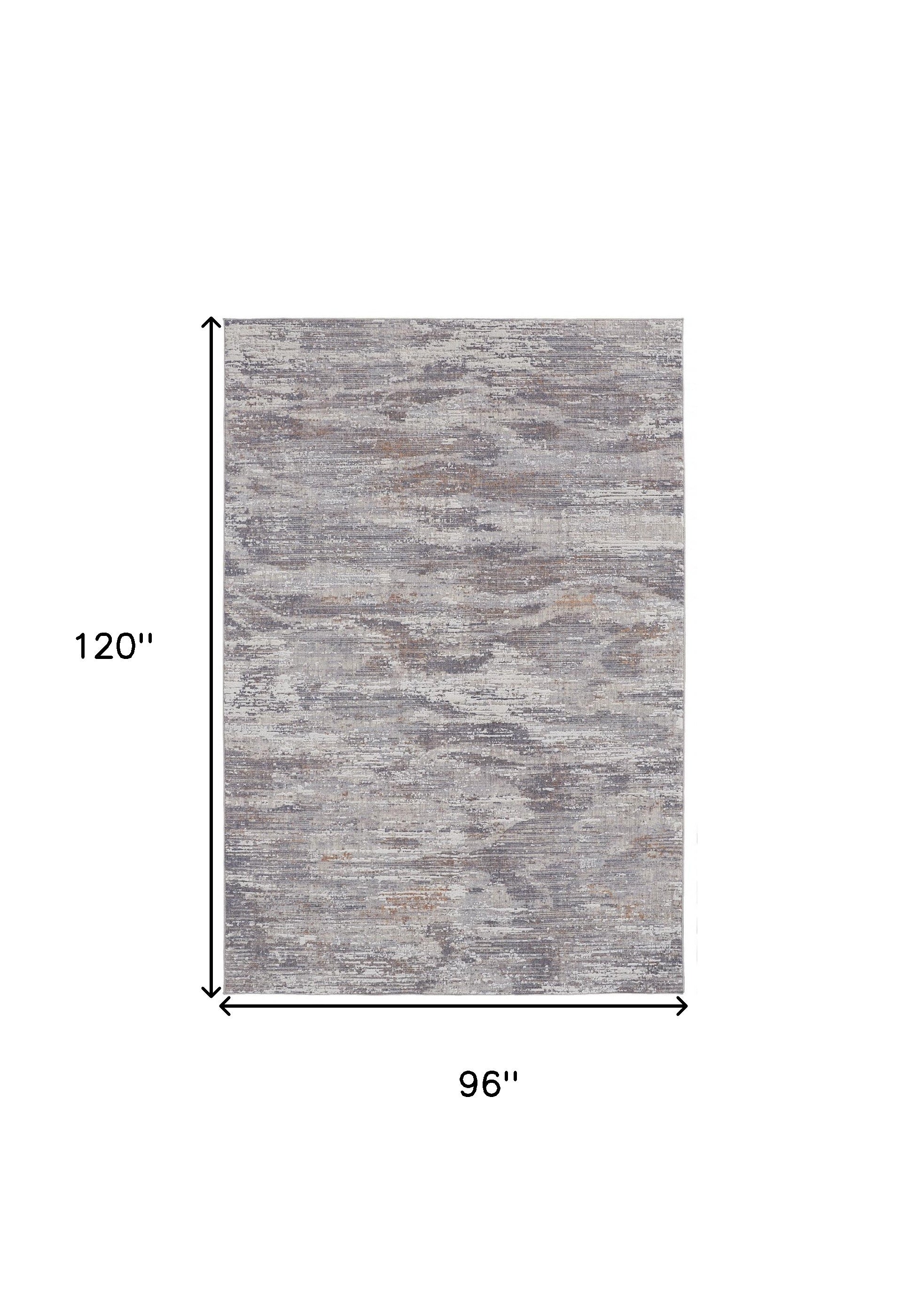 4' X 6' Tan Taupe And Gray Abstract Power Loom Distressed Stain Resistant Area Rug
