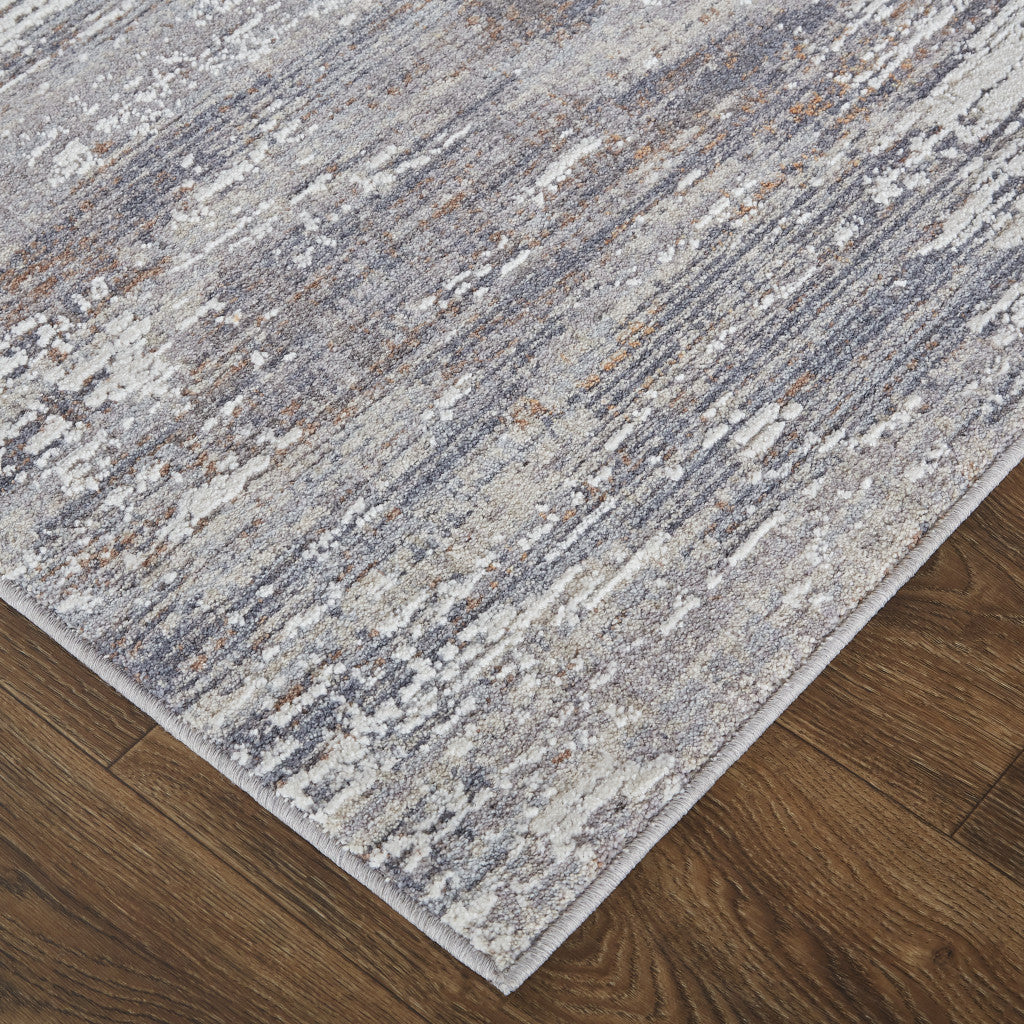 4' X 6' Tan Taupe And Gray Abstract Power Loom Distressed Stain Resistant Area Rug