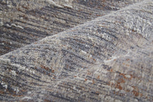 4' X 6' Tan Taupe And Gray Abstract Power Loom Distressed Stain Resistant Area Rug