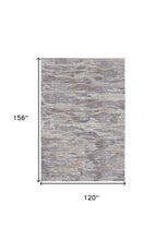 4' X 6' Tan Taupe And Gray Abstract Power Loom Distressed Stain Resistant Area Rug
