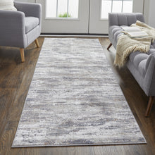 4' X 6' Tan Taupe And Gray Abstract Power Loom Distressed Stain Resistant Area Rug