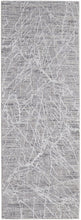 4' X 6' Taupe And Gray Abstract Power Loom Distressed Stain Resistant Area Rug