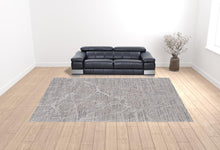 4' X 6' Taupe And Gray Abstract Power Loom Distressed Stain Resistant Area Rug