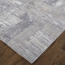 4' X 6' Taupe Tan And Blue Abstract Power Loom Distressed Stain Resistant Area Rug
