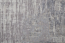 4' X 6' Taupe Tan And Blue Abstract Power Loom Distressed Stain Resistant Area Rug