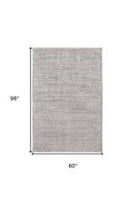 4' X 6' Taupe And Ivory Plaid Power Loom Distressed Stain Resistant Area Rug