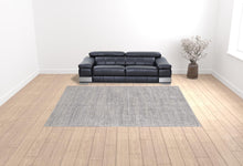 4' X 6' Taupe And Ivory Plaid Power Loom Distressed Stain Resistant Area Rug
