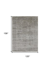 4' X 6' Gray Silver And Taupe Floral Power Loom Distressed Area Rug