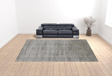 4' X 6' Gray Silver And Taupe Floral Power Loom Distressed Area Rug