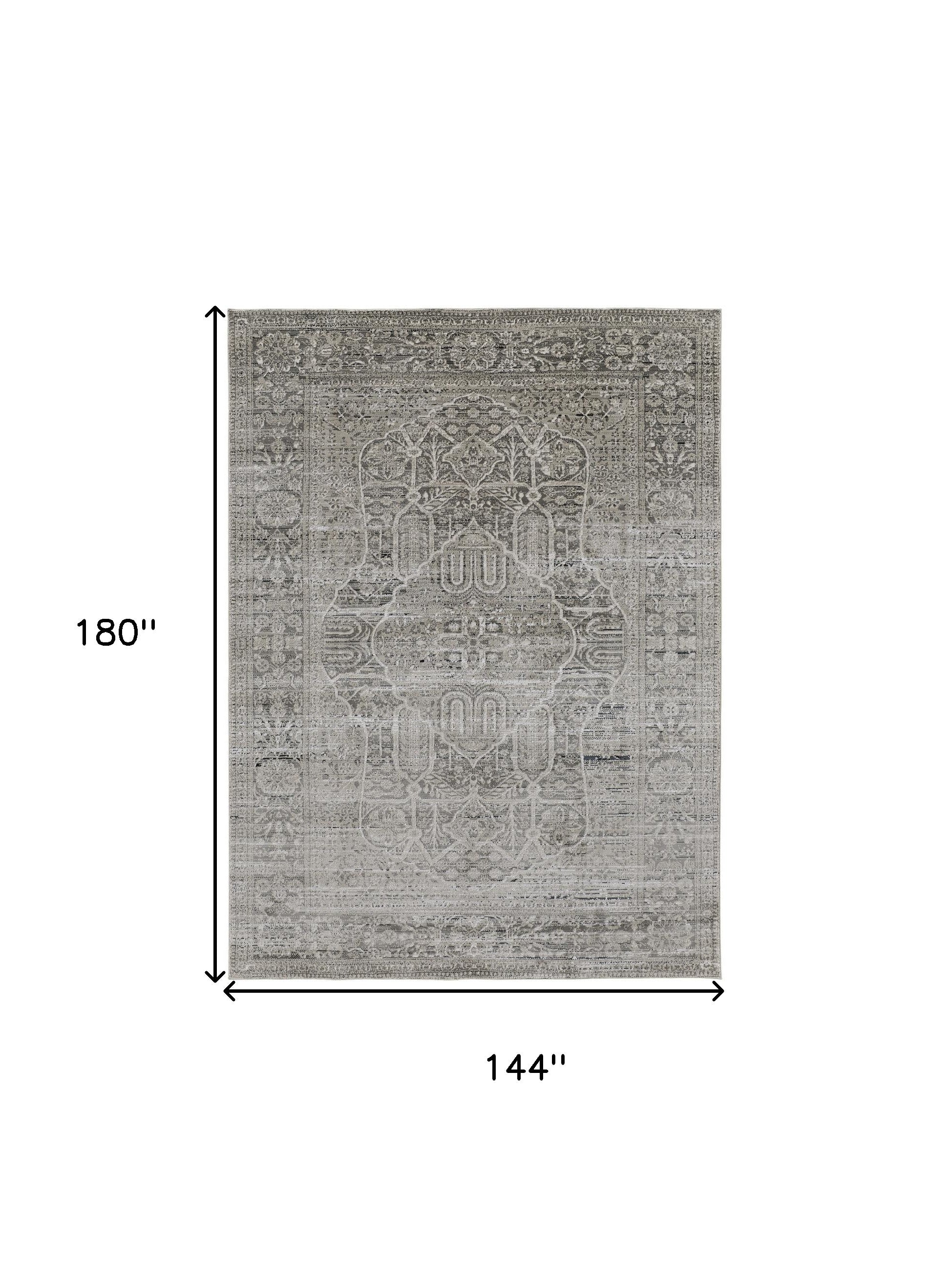 4' X 6' Gray Silver And Taupe Floral Power Loom Distressed Area Rug