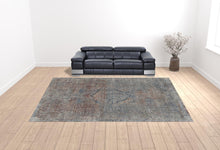 5' X 7' Blue Red And Gray Floral Power Loom Stain Resistant Area Rug