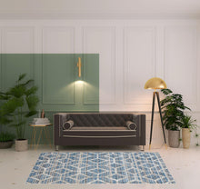 4' X 6' Tan Taupe And Ivory Geometric Power Loom Stain Resistant Area Rug