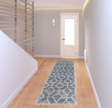 4' X 6' Tan Taupe And Ivory Geometric Power Loom Stain Resistant Area Rug