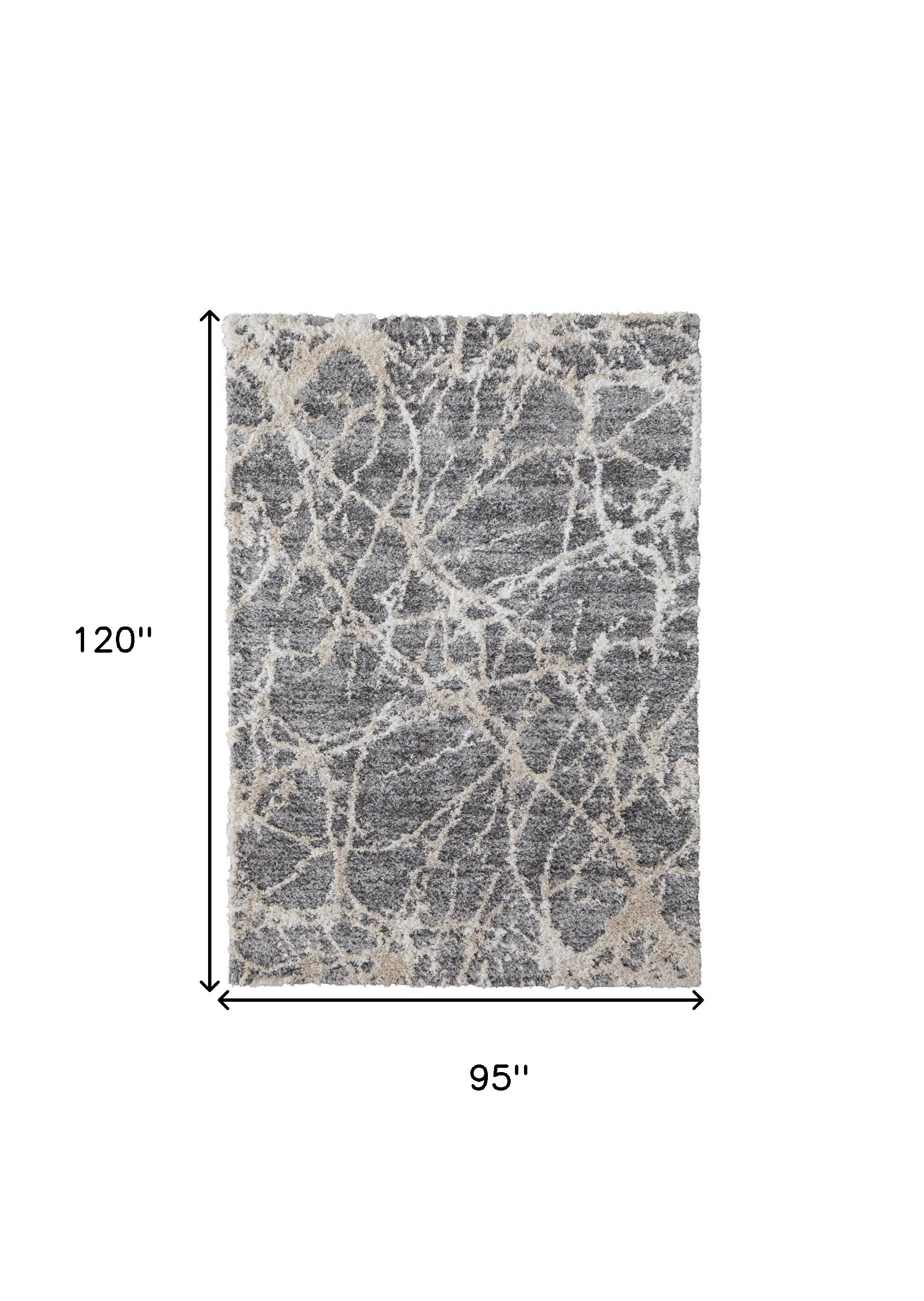 4' X 6' Gray And Ivory Abstract Power Loom Stain Resistant Area Rug