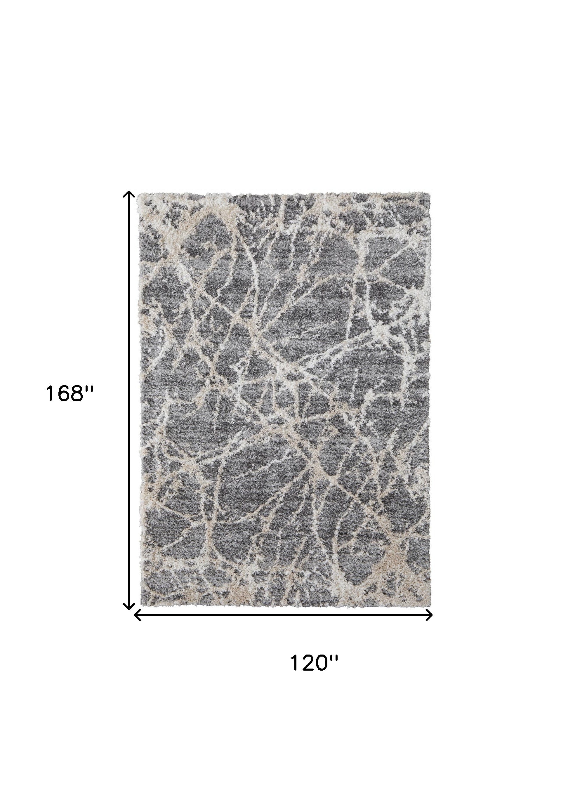 4' X 6' Gray And Ivory Abstract Power Loom Stain Resistant Area Rug