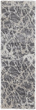 4' X 6' Gray And Ivory Abstract Power Loom Stain Resistant Area Rug
