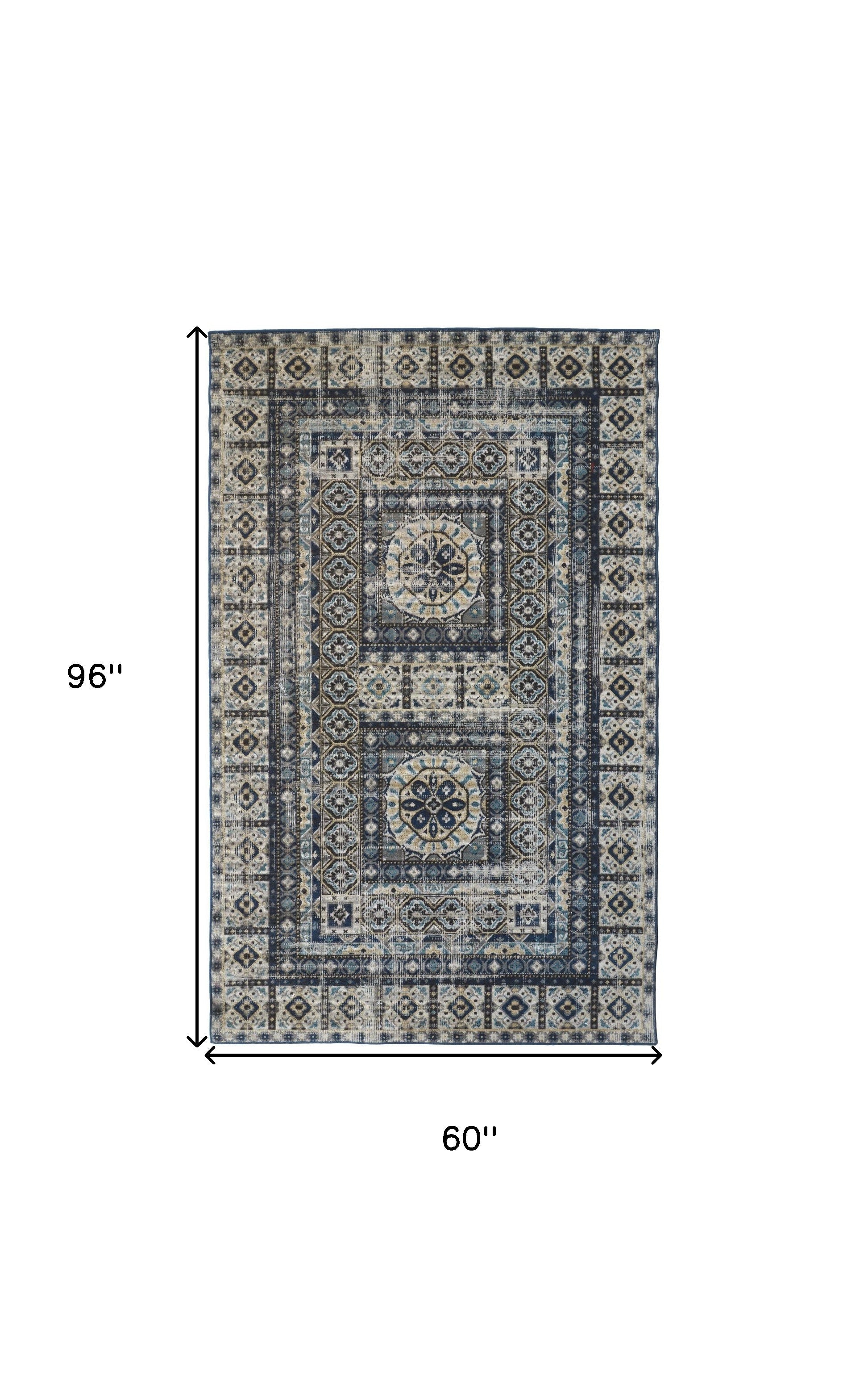 4' X 6' Ivory Tan And Blue Abstract Power Loom Distressed Stain Resistant Area Rug