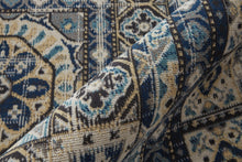 4' X 6' Ivory Tan And Blue Abstract Power Loom Distressed Stain Resistant Area Rug