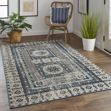 4' X 6' Ivory Tan And Blue Abstract Power Loom Distressed Stain Resistant Area Rug