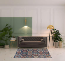 4' X 6' Blue Red And Tan Abstract Power Loom Distressed Stain Resistant Area Rug