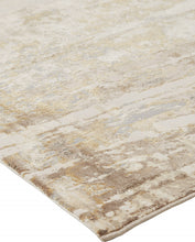 4' X 6' Tan Ivory And Gray Abstract Area Rug